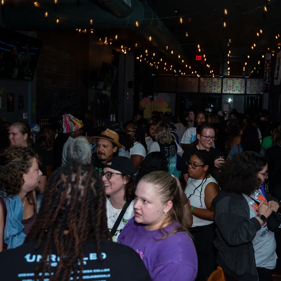 The crowd at Drawdown Brewery under the string lights